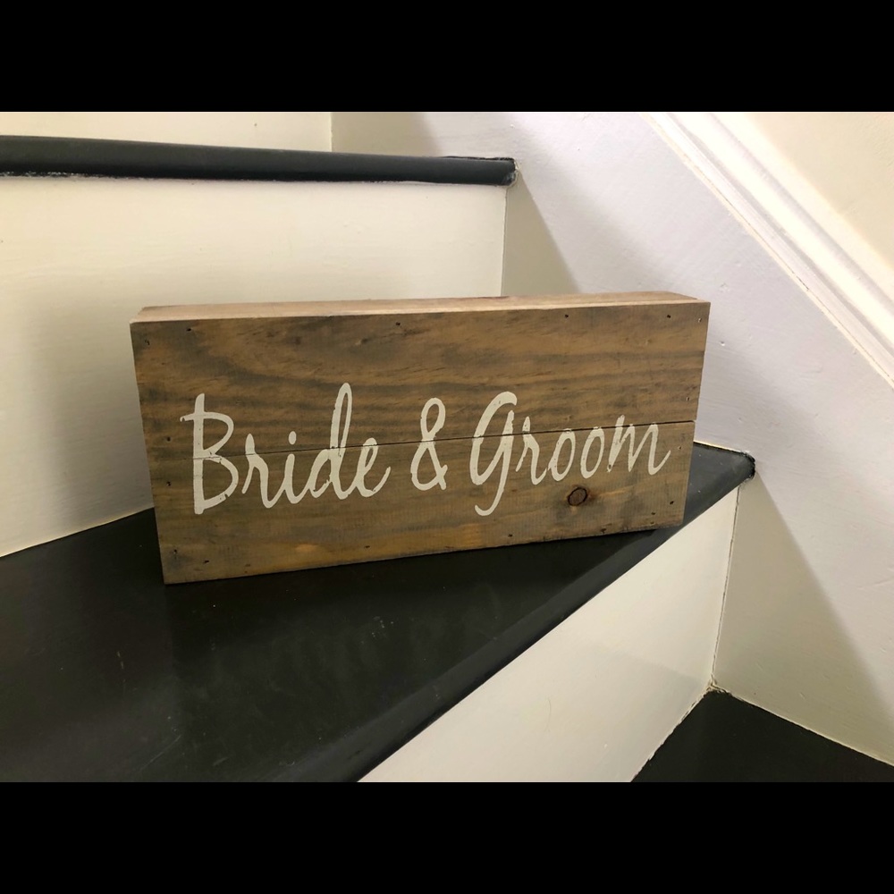Bride and groom sign